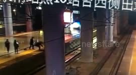 Woman jumps in front of advancing train at station 'for a joke'
