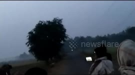 Alpha male elephant keeps villagers at bay to unite herd