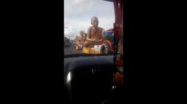 Thailand prepares for festival with a parade of giant monk statues