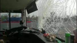 Dashcam shows bus windscreen getting smashed by flying piece of wood