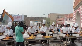 Chef's create world's largest pumpkin pie in China