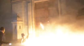 Protesters set fire to doors of palace in Mexico
