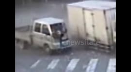 Woman flies through windscreen during crash in China