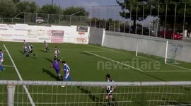 Goalkeeper scores amazing goal at amateur football match