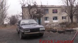 LNR forces under grenade fire while driving past Ukraine position in Nikishino.