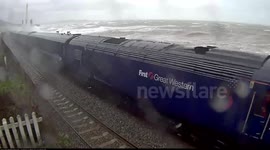 Huge waves hit Dawlish railway line in Devon, UK
