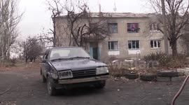 LNR forces under grenade fire while driving past Ukraine position in Nikishino