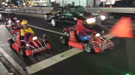 Mario Karts driven around the streets of Tokyo