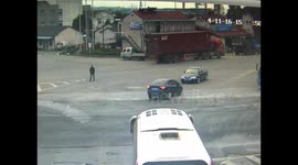 Lucky pedestrian escapes car crash at crossroads