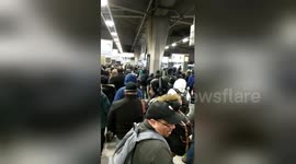 Commuter chaos at George Washington Bridge bus station during snowstorm