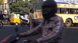Indian fruit vendor dodges cars as he takes street food to the next level