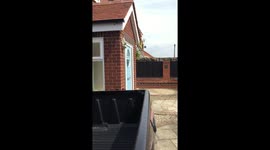 Nasty Neighbour hurls abuse over the fence at mother and daughter