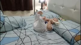 Adorable baby kept kicking his legs
