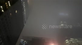 Fog engulfs London skyscrapers