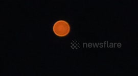 Bizarre red UFO spotted above mountains in northern Thailand