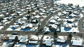 A day after a snowstorm in Denver a look from a drone, beautiful view of houses topped up with snow in north of Denver