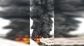 Pillar of black smoke spews from huge fire at Chinese industrial park