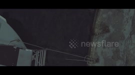 Drone flies above boats and than crashes