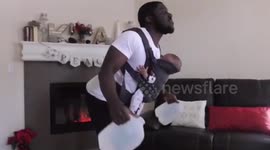 Father uses baby as weights in dad-baby workout routine