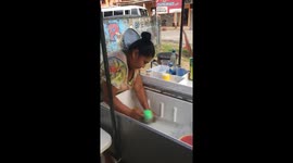 Costa Rica, woman making the ice cream.