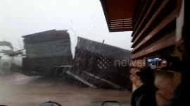 Moment house is blown away in powerful storm in Thailand