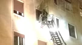 Firefighters save woman threatening to jump off her third-floor apartment in Rome