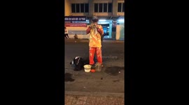 Bizarre moment street performer puts snake up his nose and out his mouth