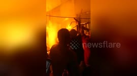 Good Samaritans rescue elderly couple trapped in burning house