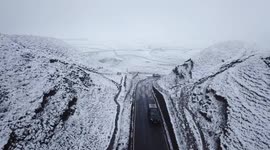 Parts of the UK woke up to snowfall today after temperatures plummeted overnight in a bitter cold snap.