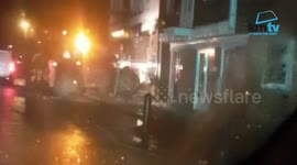 Thieves demolished half a supermarket with a crane