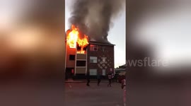 Dramatic footage shows residents jumping from burning Dallas apartment