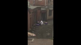 Man films takeaway worker chopping raw meat down back alley