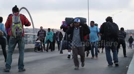 Footage shows Honduran migrants walking towards US-Mexico border
