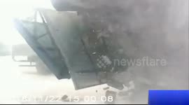 Passerby runs away seconds before warehouse collapses in dramatic crash
