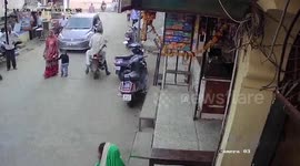 Woman and her young son escape serious injury when car ploughs into them