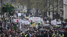 Climate change activists disrupt London with 'funeral march'