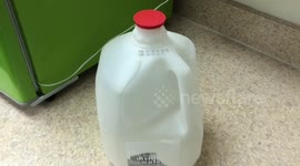 Cap on empty bottle moves independently