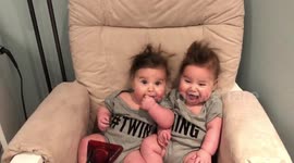 Baby twin girls love a good blow dry