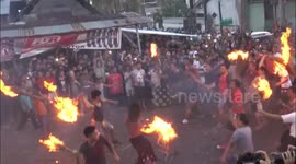 Rituals of the Unique War of Fire Tradition Expels Evil Disease and Spirit in Indonesia