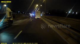 Truck dashcam catches vehicle pickup fail on hard shoulder