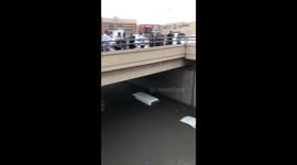 Cars submerged after heavy downpour floods underpass in Saudi Arabia