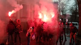 Flares and fire as Ukrainians protest outside Russian consulate in Kharkiv