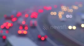 Motorists brace themselves as they battle thick fog during rush hour in Leeds