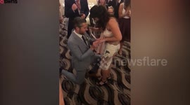 Hilarious moment bridesmaid caught bouquet - and her boyfriend immediately dropped on one knee and proposed