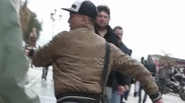 Moment victim confronts mobile phone thief on busy shopping street