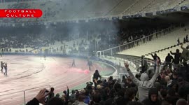 Hooligans AEK attacking Ajax-fans with petrol bomb
