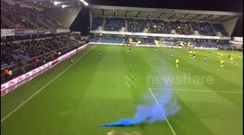 Birmingham City fans threw a blue flare onto the pitch after scoring first goal