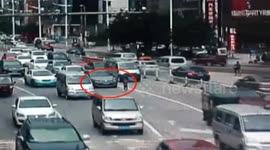 Girl falls out of three-wheeler onto busy road