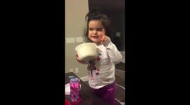 Toddler very firmly against sharing her popcorn