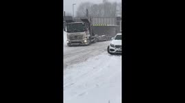 Truck gets stuck in snow